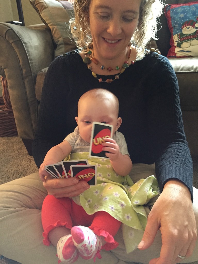 Helping Mommy play Uno