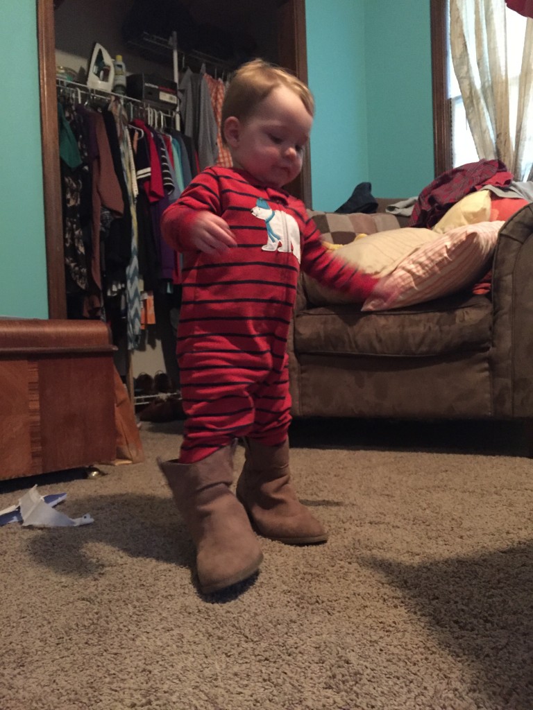 Trying on Mommy's boots ;)